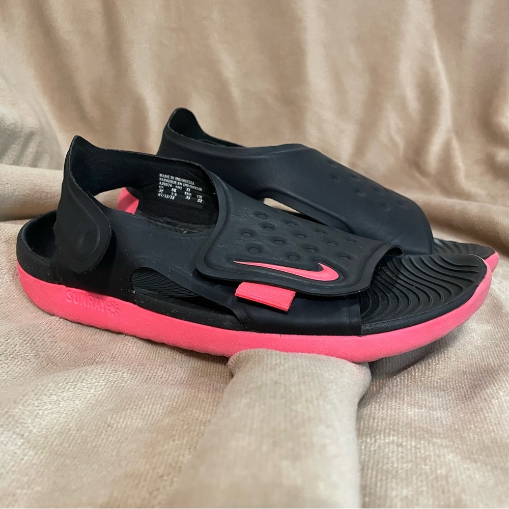 Nike Sunday Black Slides with Pink Accent Sole.
